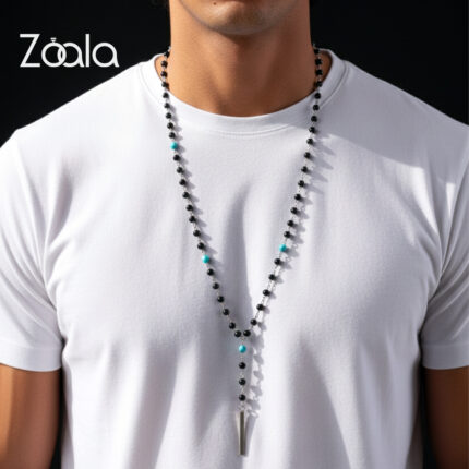 this piece of black Onyx, Turquoise, and a silver bar pendant.